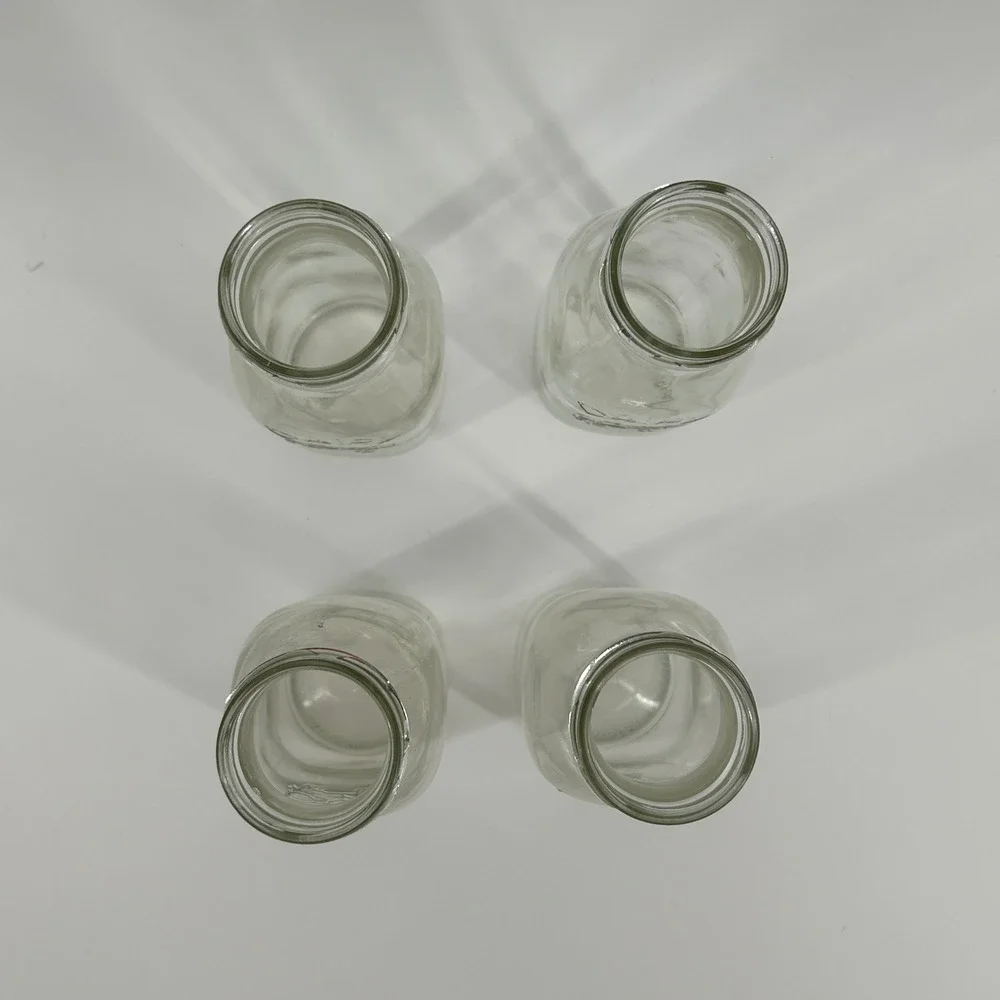 Set of 4 Vintage Style Glass Milk Bottles Embossed Cow Dairy Farmhouse Decor